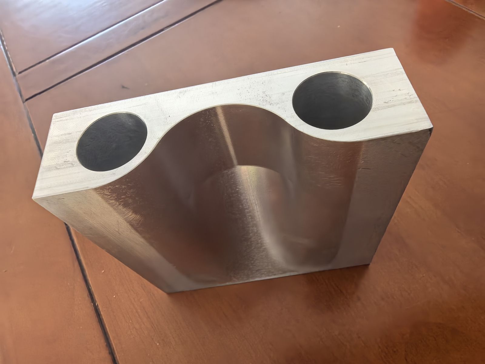 Large aluminum block with dual radius pockets