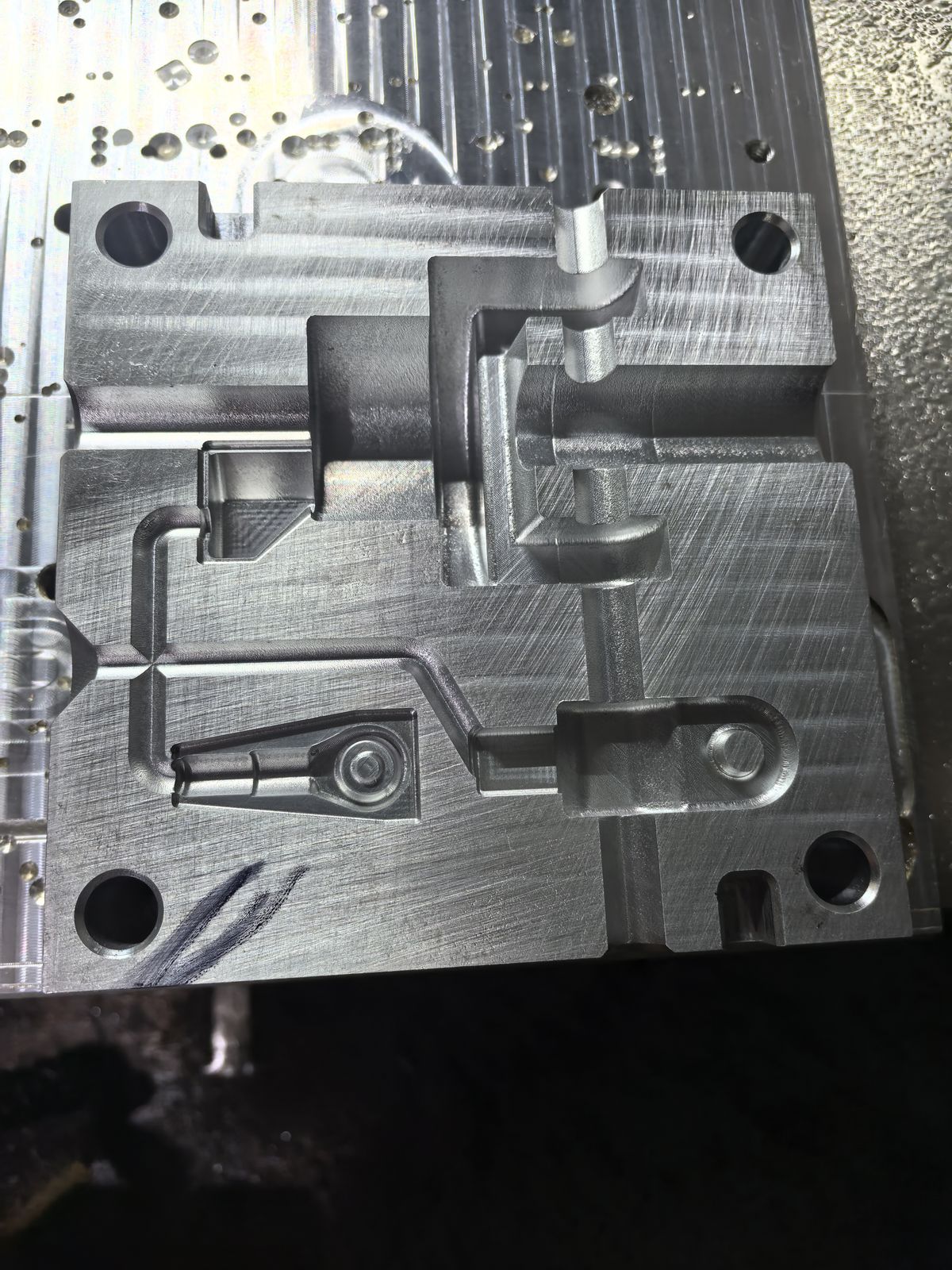 Aluminum mold plate with four machined cavities